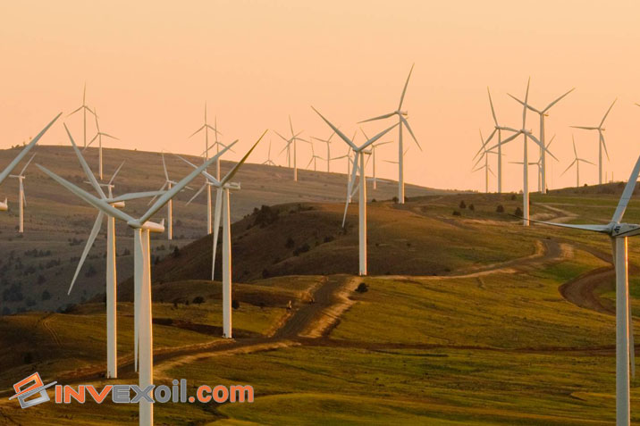 wind turbine farm in sunset, how does a wind turbine generate electricity?